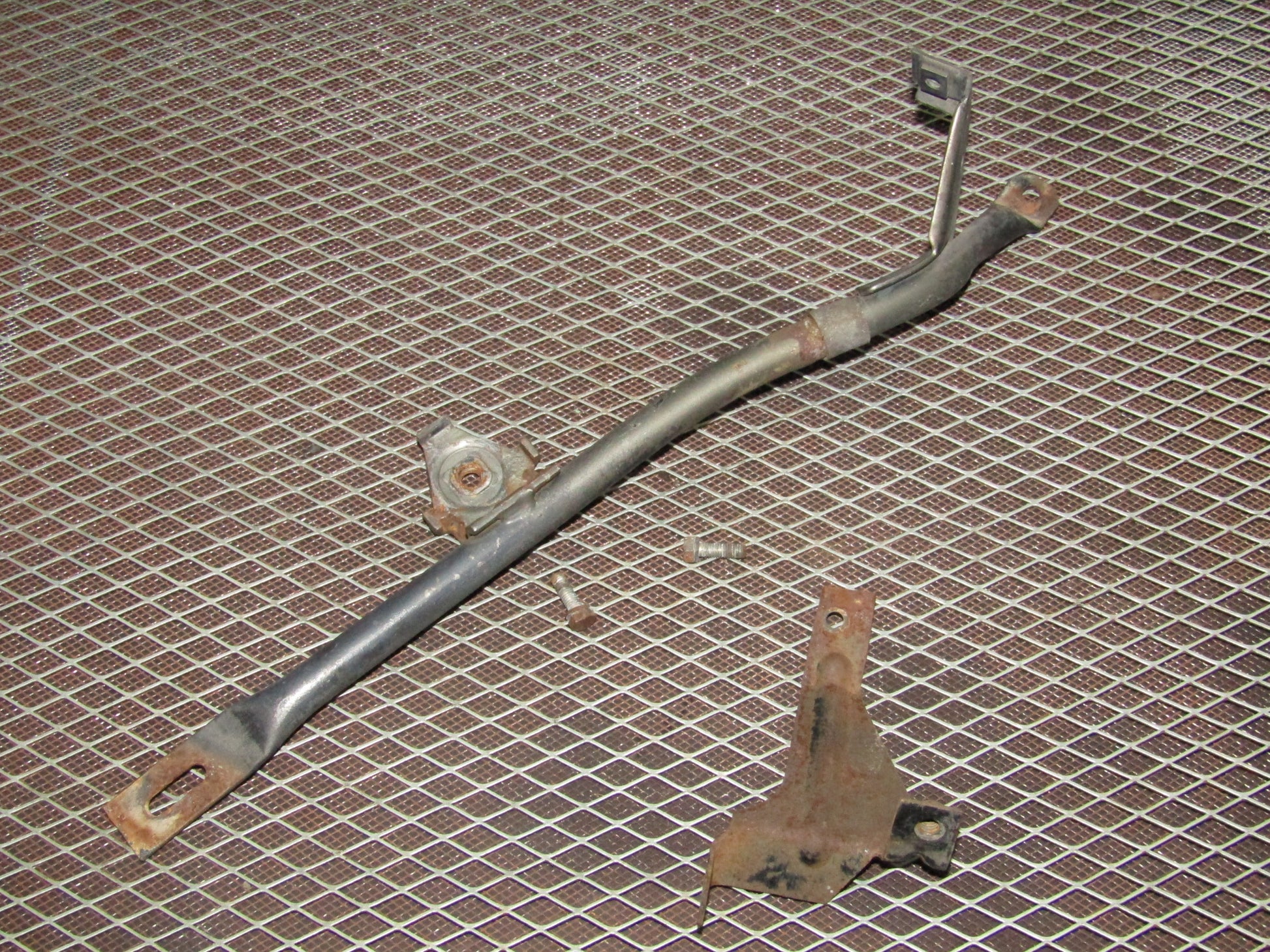 86-93 Mercedes Benz 300E OEM A/C Condenser Fan Mounting Bar Bracket