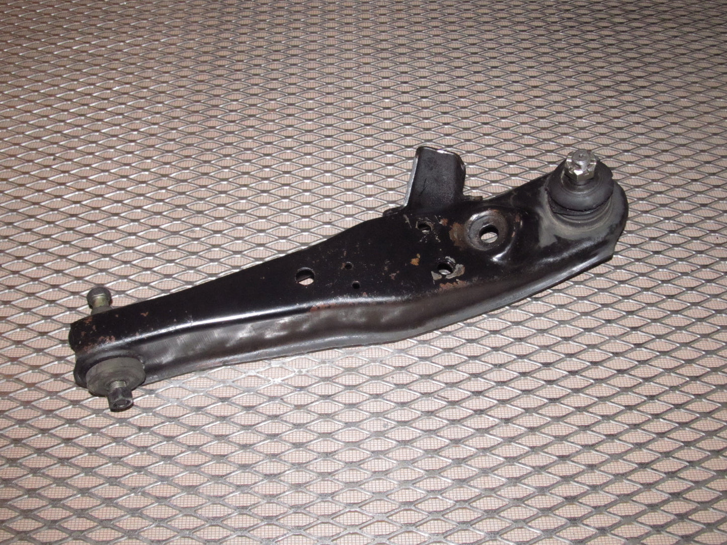 81-83 Mazda RX7 OEM Front Lower Control Arm - Left