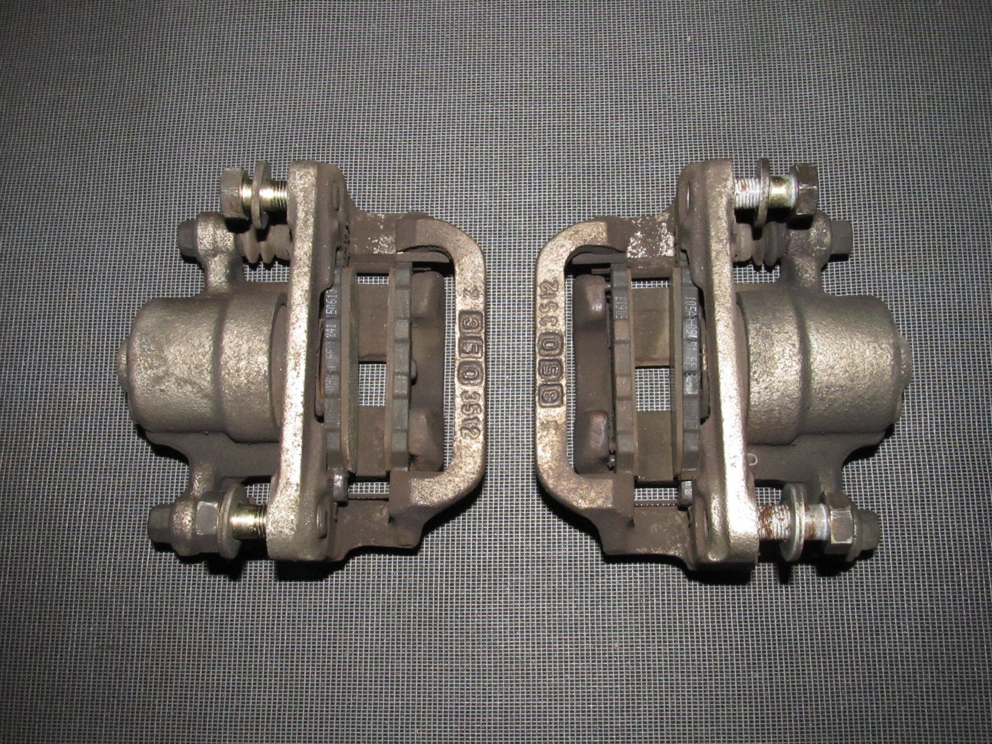 03-04 Infiniti G35 Sedan OEM Rear Brake Caliper Set