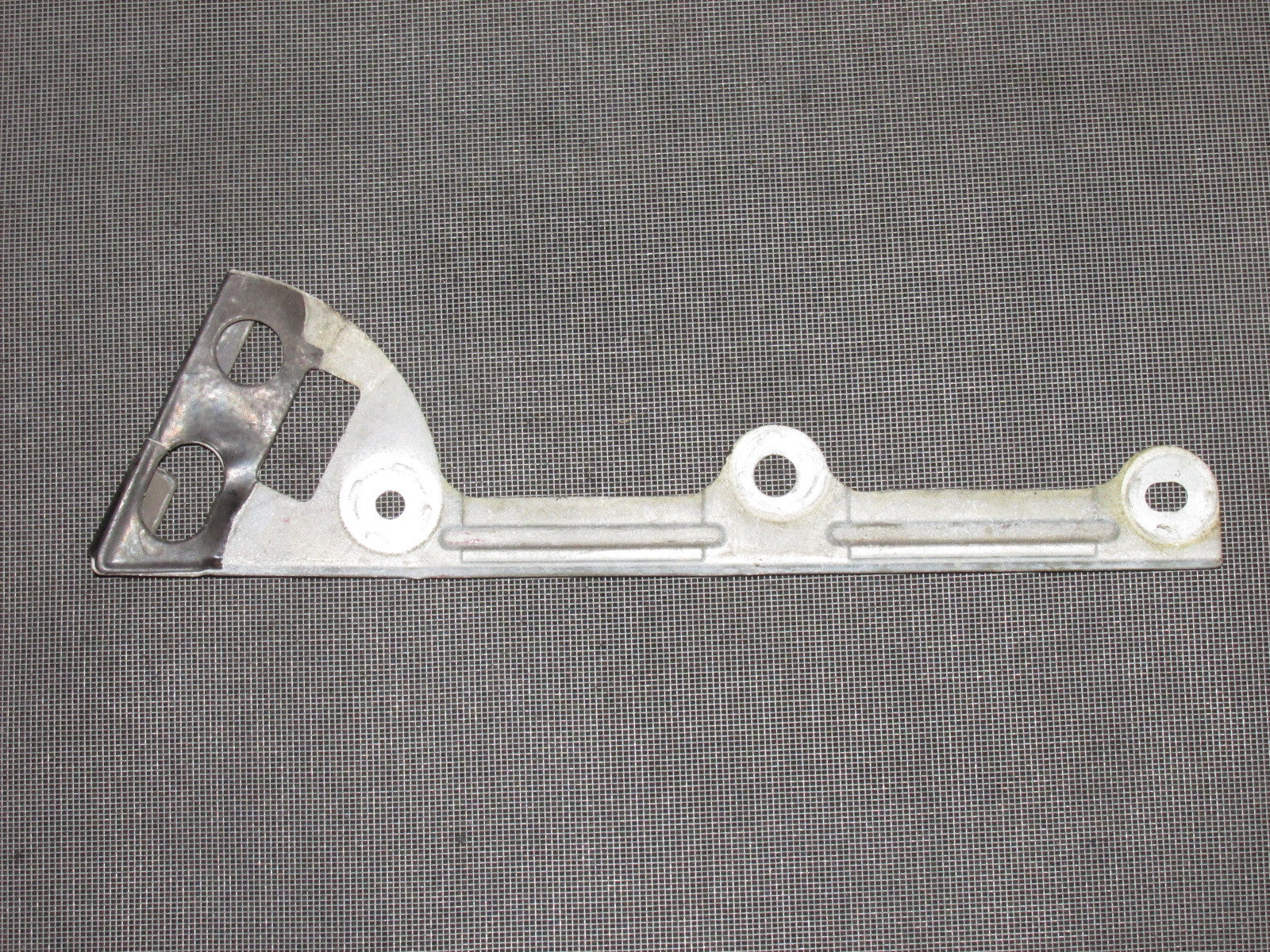 91 92 93 94 95 Toyota MR2 OEM Window Bracket - Left