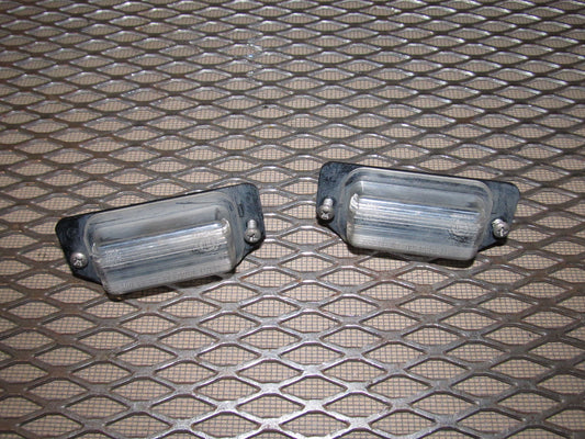 97 98 99 Mitsubishi Eclipse OEM Convertible Rear License Plate Light Lens Housing