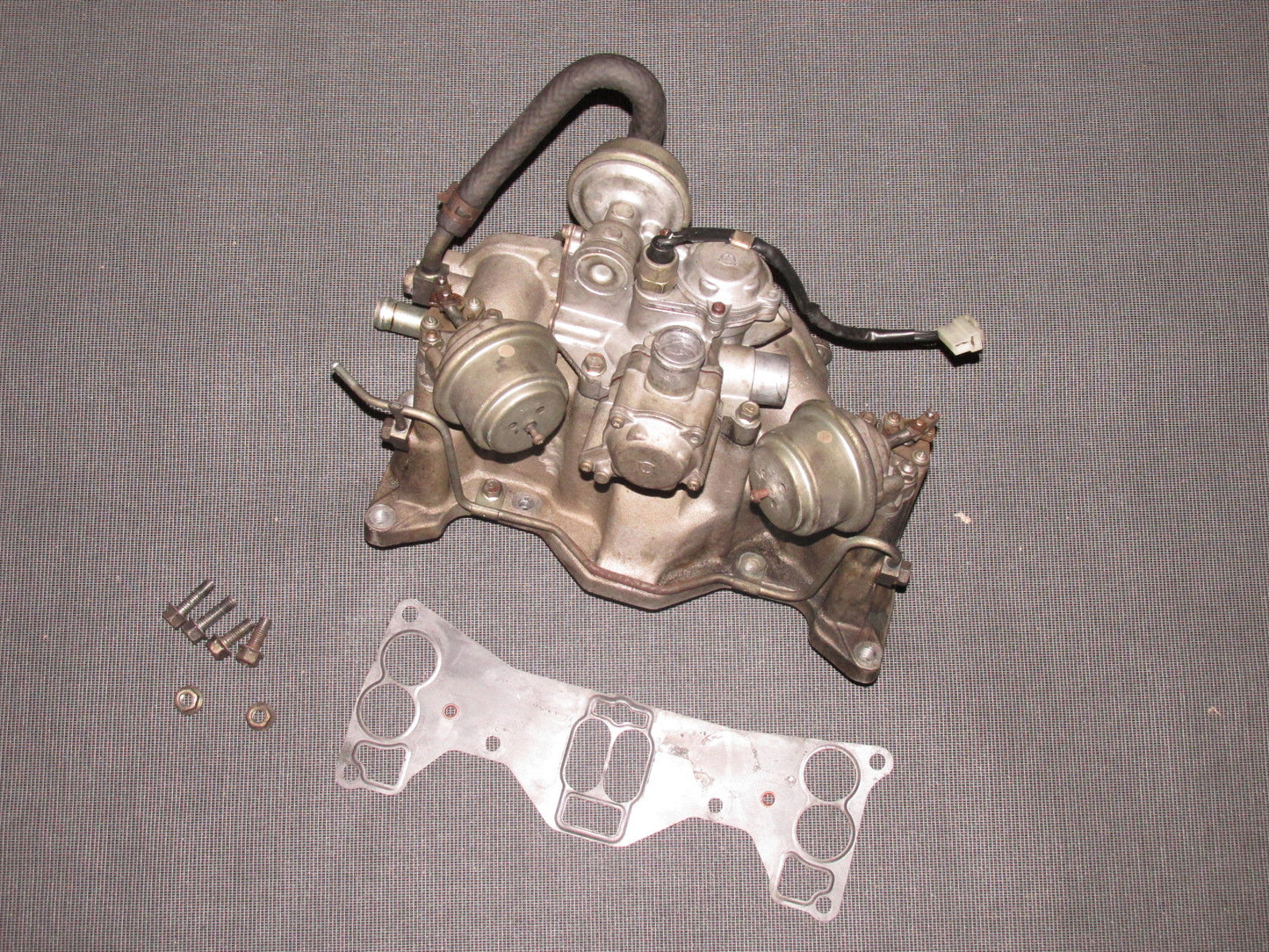 84 85 Mazda RX7 OEM 13B Lower Intake Manifold Assembly