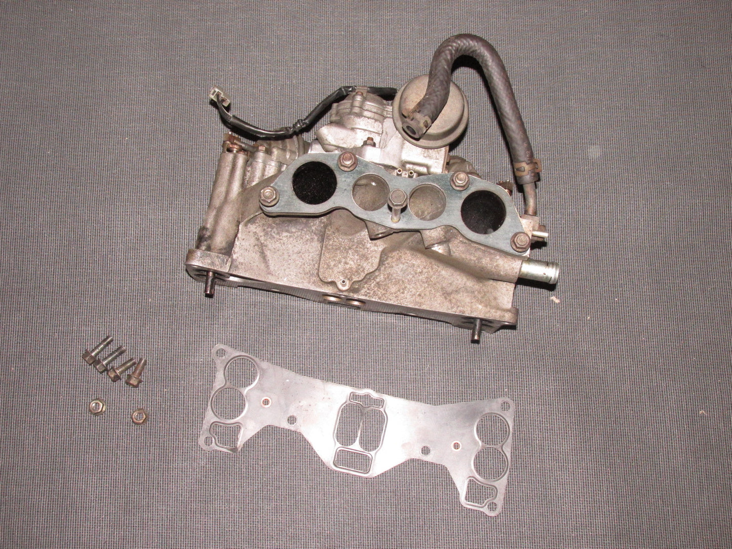 84 85 Mazda RX7 OEM 13B Lower Intake Manifold Assembly