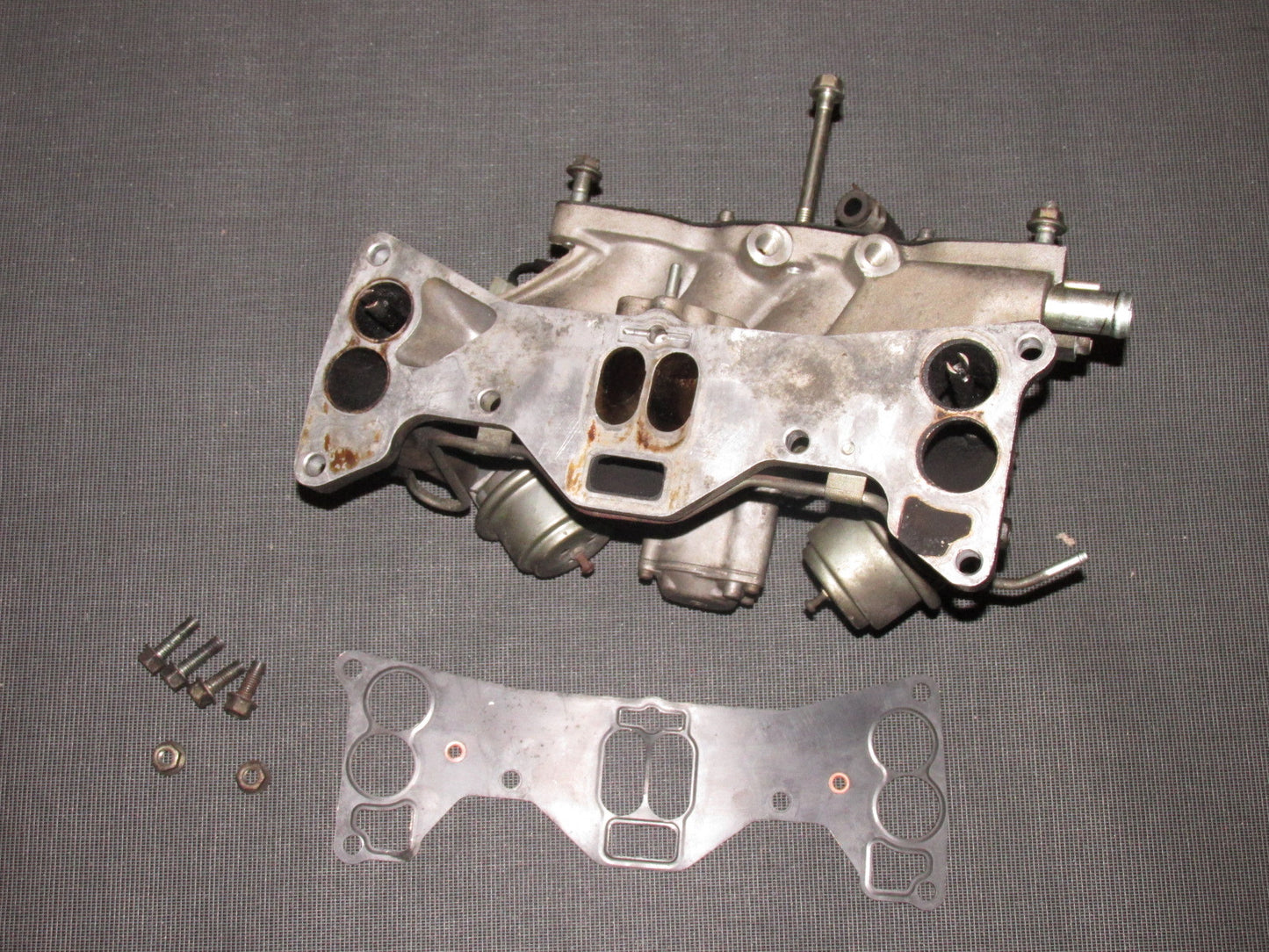 84 85 Mazda RX7 OEM 13B Lower Intake Manifold Assembly