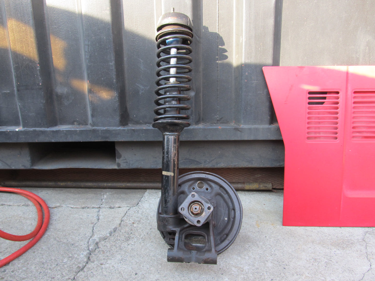 72 73 Datsun 240z OEM Rear Spindle Shock & Hub Assembly - Left