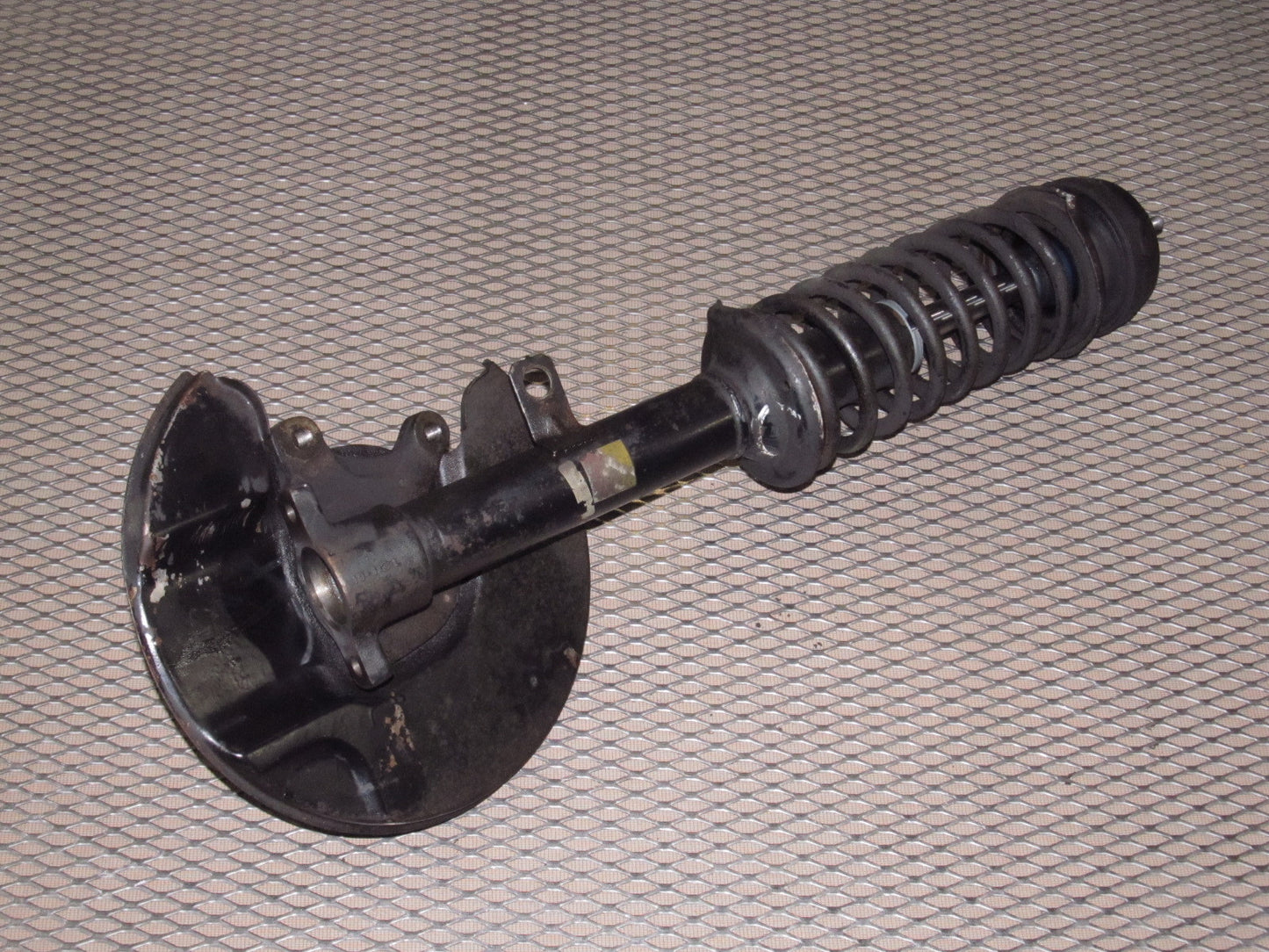 72 73 Datsun 240z OEM Front Spindle & Shock Assembly - Left