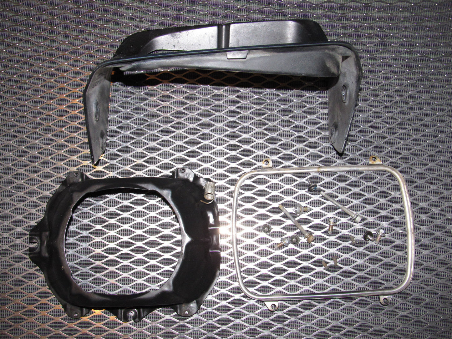 89 90 91 92 Toyota Supra Headlight Bezel & Cover - Left