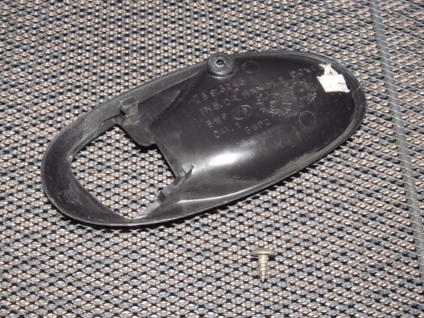 97 98 99 Mitsubishi Eclipse OEM Interior Door Handle Bezel - Left