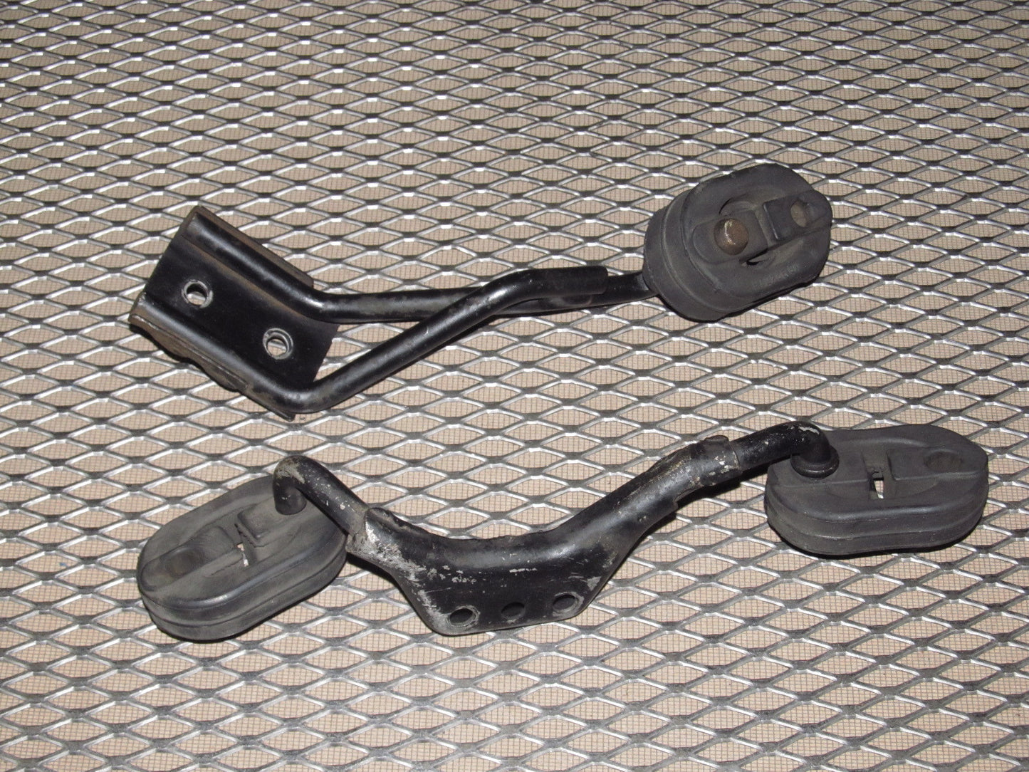 97 98 99 Mitsubishi Eclipse OEM Headlight - Left97 98 99 Mitsubishi Eclipse OEM Exhaust Pipe Hanger & Bracket