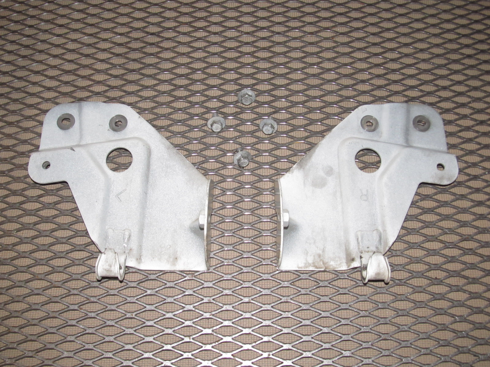 90-93 Mazda Miata OEM Lower Radiator Mounting Bracket Set