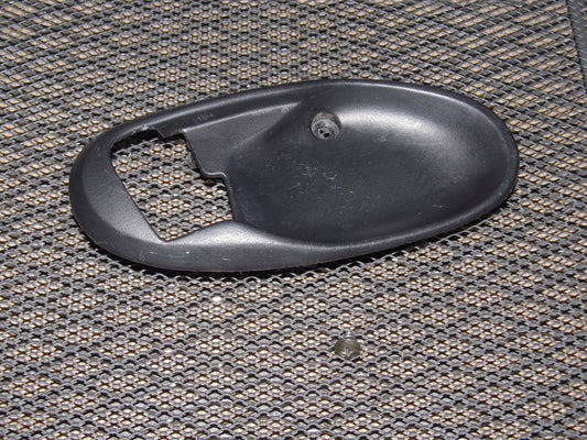 97 98 99 Mitsubishi Eclipse OEM Door Handle Bezel - Right97 98 99 Mitsubishi Eclipse OEM Interior Door Handle Bezel - Right