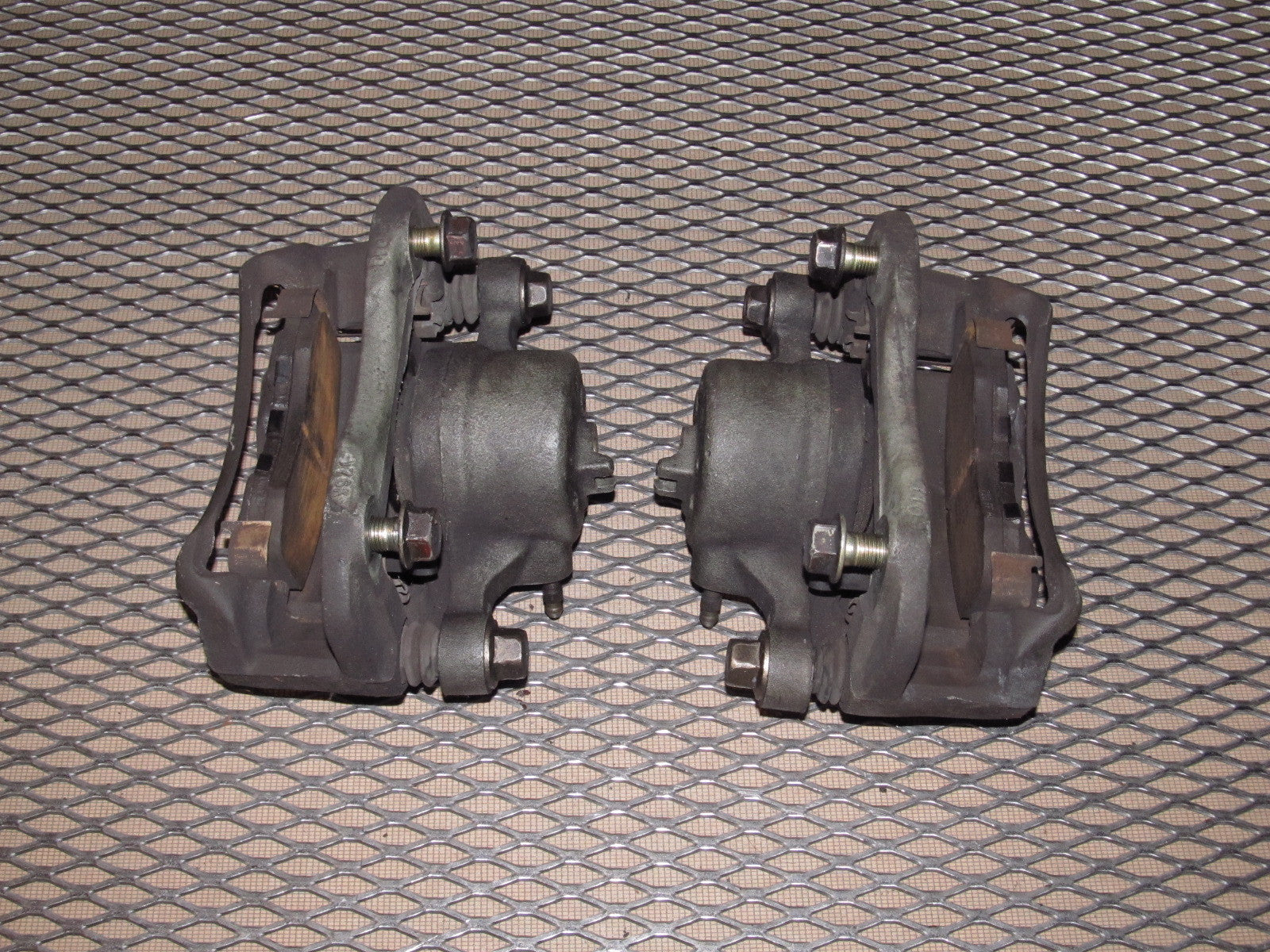 97 98 99 Mitsubishi Eclipse OEM Front Brake Caliper Set