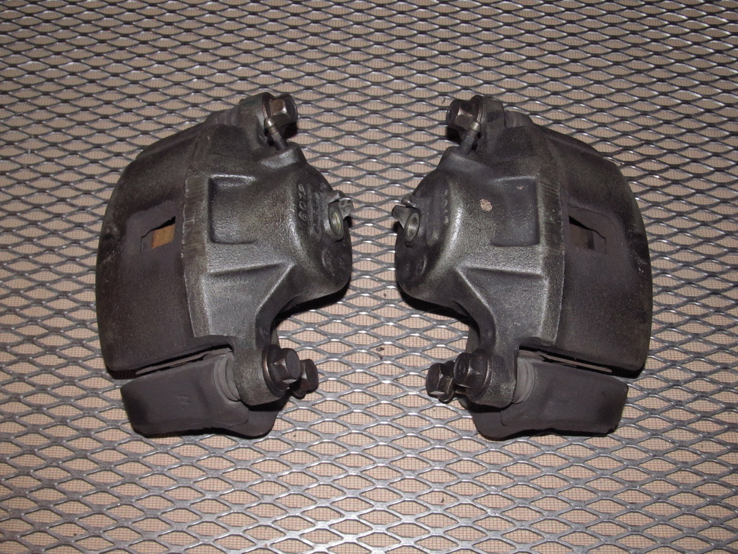 97 98 99 Mitsubishi Eclipse OEM Front Brake Caliper Set