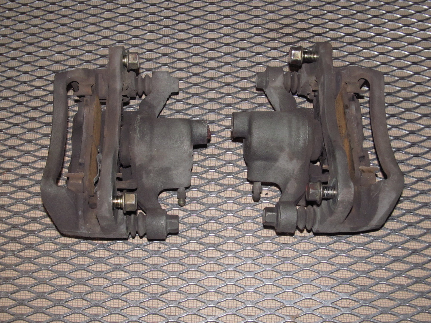 97 98 99 Mitsubishi Eclipse OEM Rear Brake Caliper Set