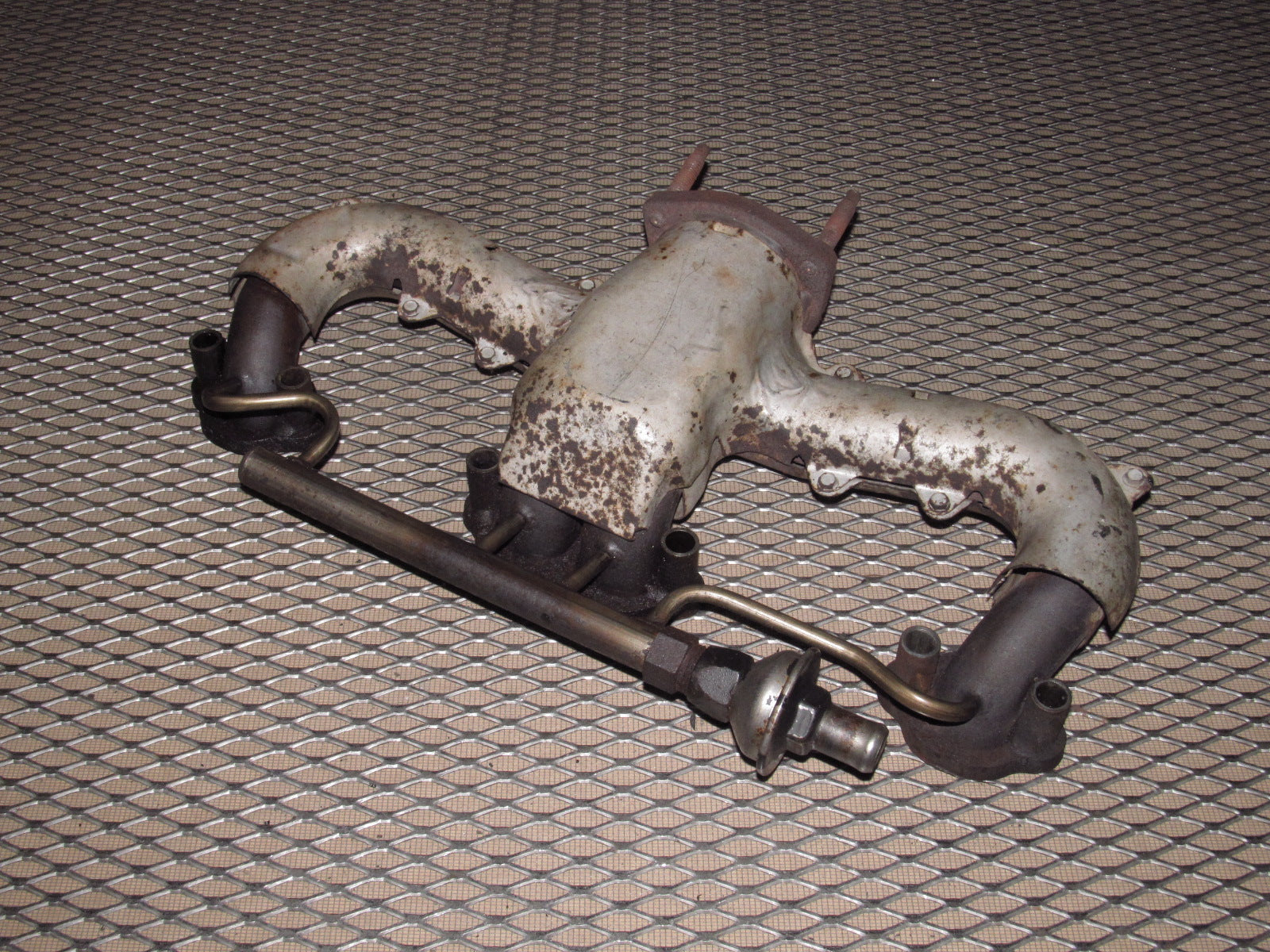 84-85 Chevrolet Corvette OEM Exhaust Manifold - Left