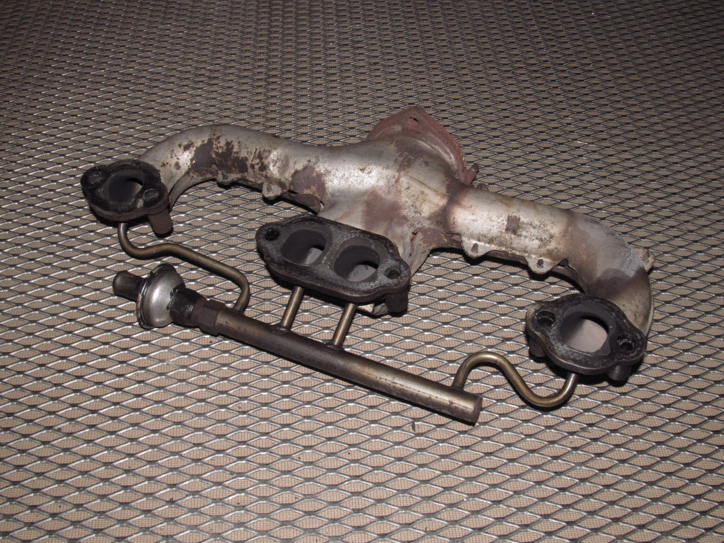 84-85 Chevrolet Corvette OEM Exhaust Manifold - Left